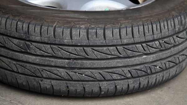 Old car tire — Stock Photo, Image