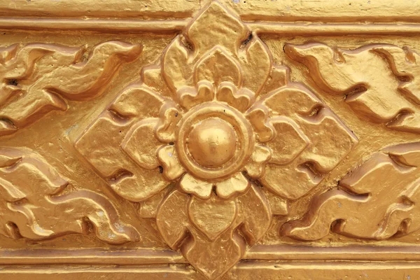 Ouro esculpido flor — Fotografia de Stock