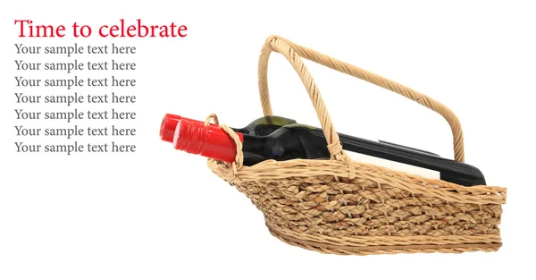 Wine bottles on present basket isolated on white — Stock Photo, Image