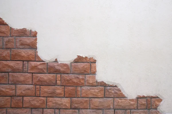 Cracked White wall with orange brick — Stock Photo, Image