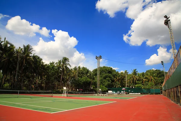 Outdoor tennis courts against blue sky — Stock Photo, Image