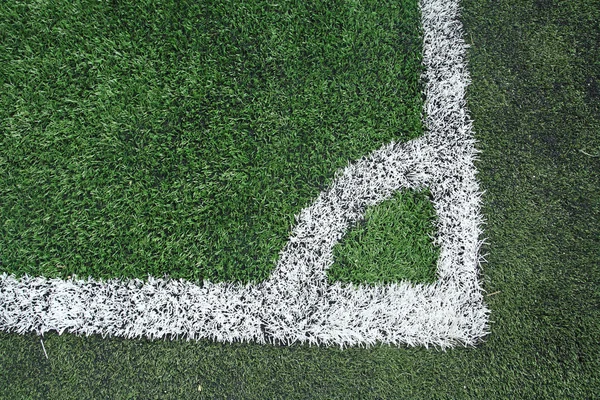 Campo de futebol canto grama — Fotografia de Stock