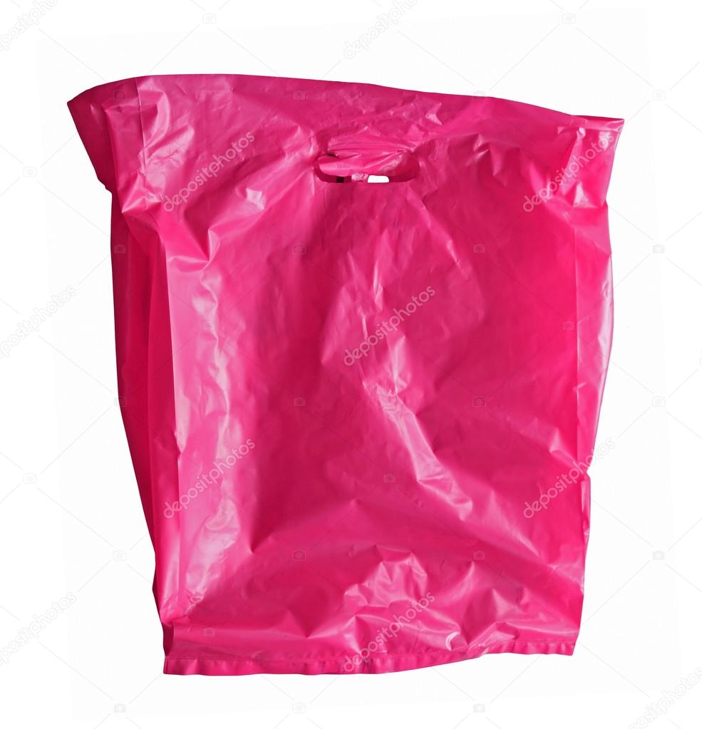 Pink plastic bag isolated on white 