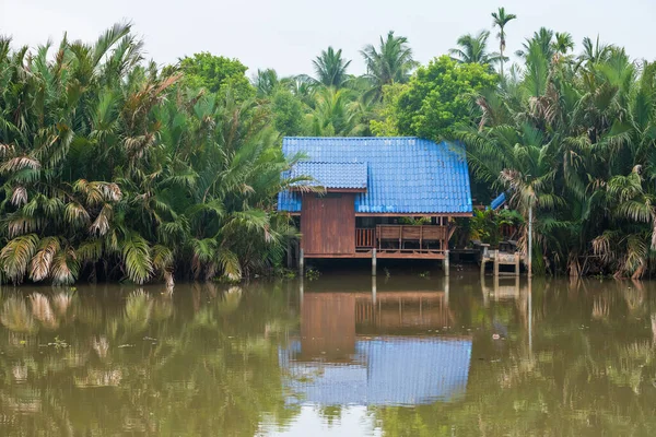 Traditional Thai Wooden House Nipa Palms Growing River Reflection Still —  Fotos de Stock