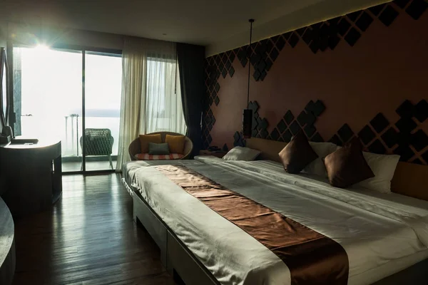 Family hotel room with modern decoration design by the sea at sunset, Phuket, Thailand. Travel or holiday maker in tropical country, Siam.