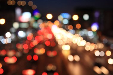 Blurred Defocused cars and bulding lights with Heavy Traffic on street of Bangkok city, Thailand.