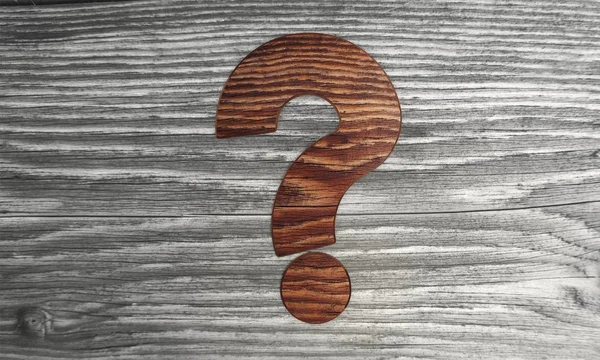 Biological question mark in a wooden background — Stock Photo, Image