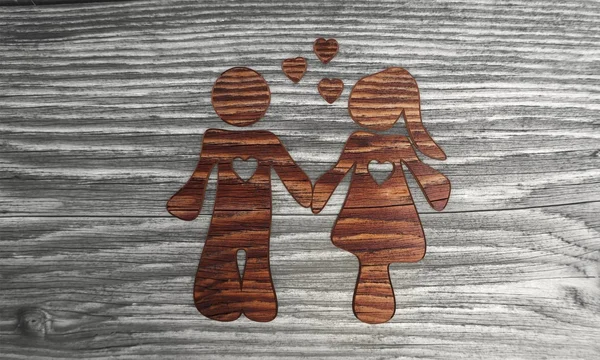 Σύμβολο ευγενή σχέσης σε ένα ξύλινο υπόβαθρο — Φωτογραφία Αρχείου