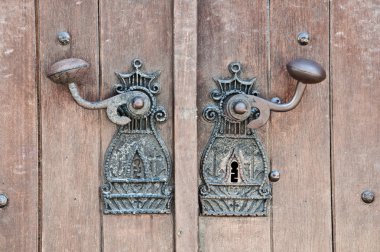 Ancient monastery door handle clipart