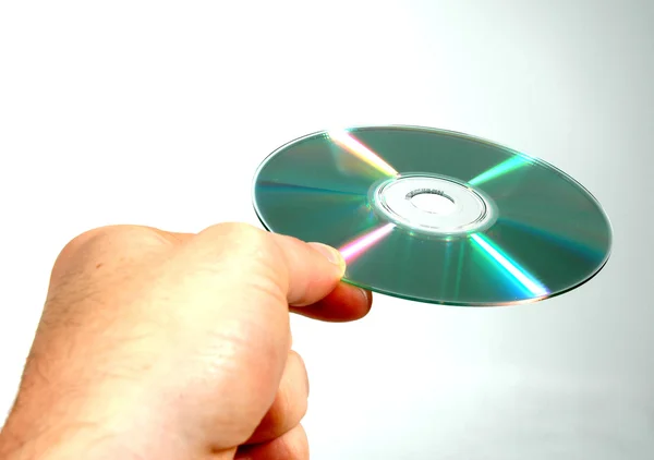 Даючи компакт-диска — стокове фото