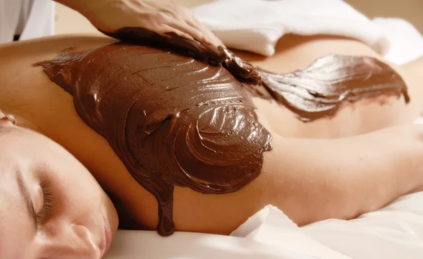 Massagem de chocolate Fotos De Bancos De Imagens Sem Royalties