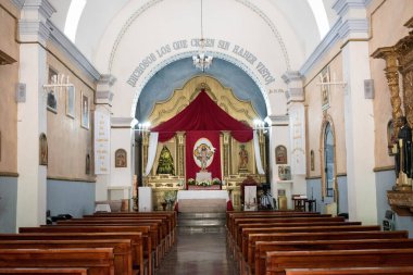 OAXACA, OAXACA, MEXICO- MAY 26, 2022: Interior of the Santo Toms Temple with the main altar in the background at Xochimilco neighborhood in Oaxaca, Mexico