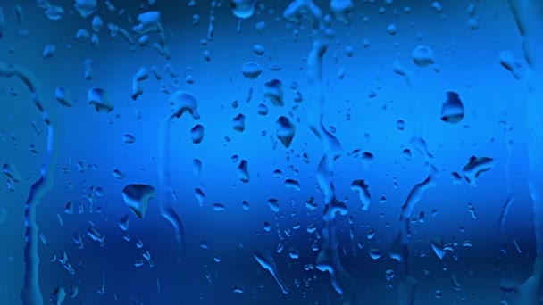 Gotas de lluvia en el cristal de la ventana — Vídeos de Stock
