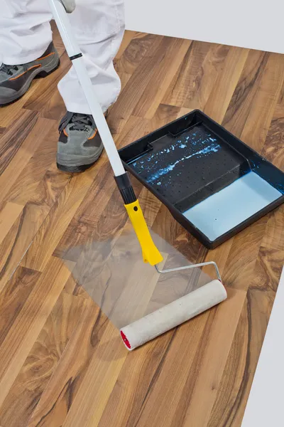 Painting with primer wooden floor for waterproofing — Stock Photo, Image