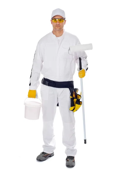 Worker in white overalls holding paint brush bucket — Stock Photo, Image