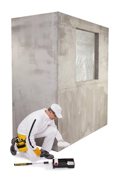 Worker pouring a primer in a paint tray — Stock Image Worker pouring a primer in a paint tray Stock Picture
