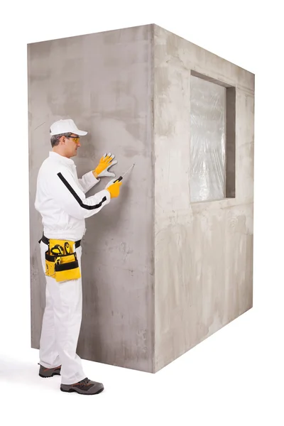 Worker checking the surface — Stock Image Worker checking the surface Royalty Free Stock Images