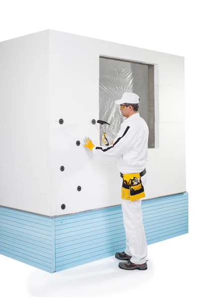 Worker fixing a dowel — Stock Photo, Image