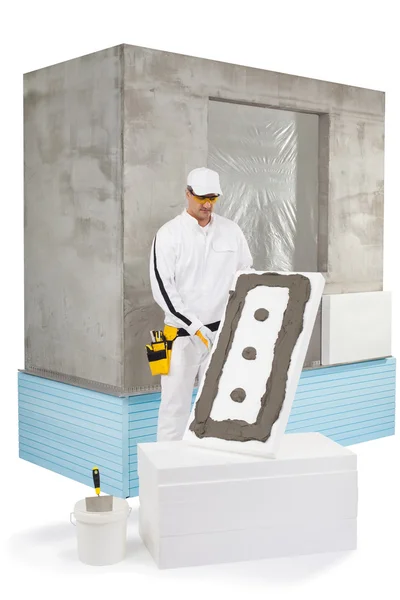 Trabalhador segurando um painel de isolamento revestido com um alaúde — Fotografia de Stock