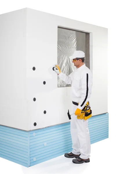 Worker fixing a dowel — Stock Photo, Image