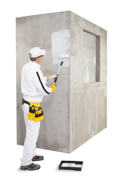 Worker priming with a paint roller — Stock Photo, Image