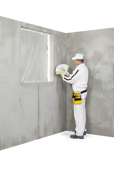 Worker holding a colour samples palette — Stock Photo, Image