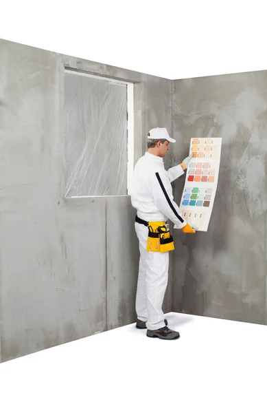 Worker holding a colour samples palette — Stock Photo, Image