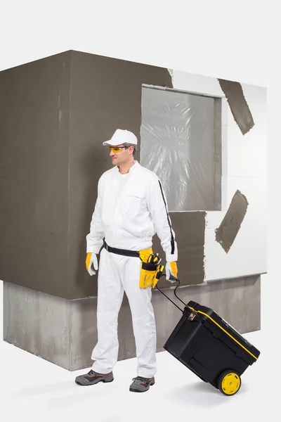 Trabajador con una caja de herramientas Imagen De Stock