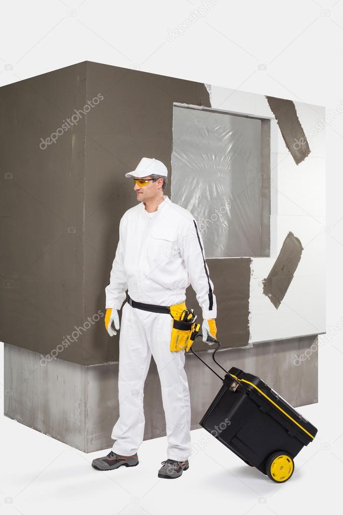Worker with a box of tools