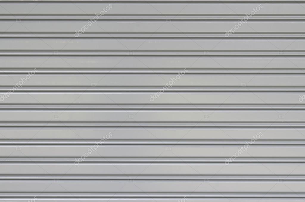 Corrugated metal sheet slide door texture Stock Photo by ©bentaboe 42861843