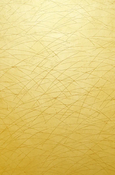 Abstract golden texture of sandblasted glass