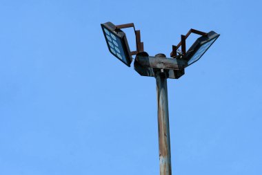 old electric light and pole