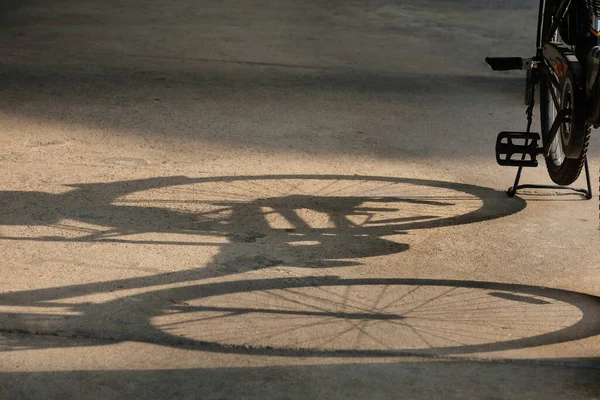 shadow of the bicycle in the city