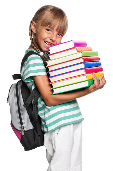 Klein meisje met boeken — Stockfoto