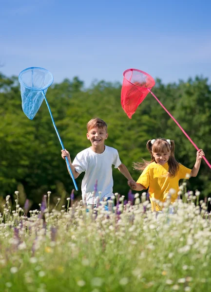 Happy children on meadow — Stock Photo, Image