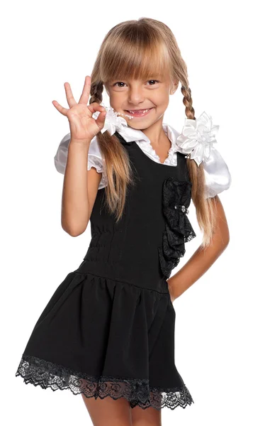 Little girl in school uniform — Stock Photo, Image