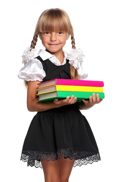 Little girl with books — Stock Photo, Image