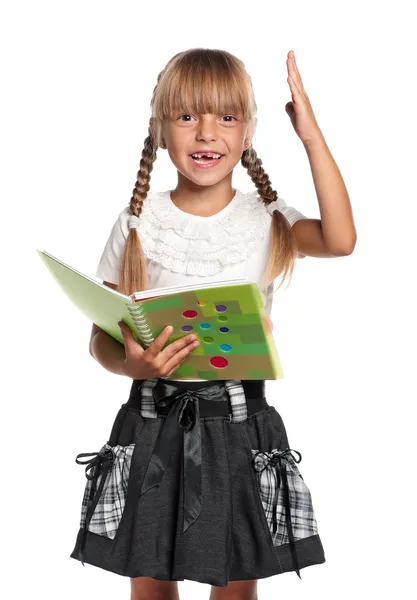 Little girl with exercise books — Stock Photo, Image