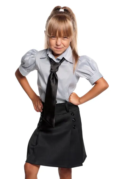 Okul üniforması giyen küçük kız — Stok fotoğraf