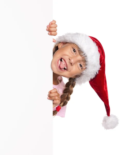 Petite fille en chapeau de Père Noël — Photo