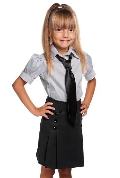 Liten flicka i skoluniform — Stockfoto