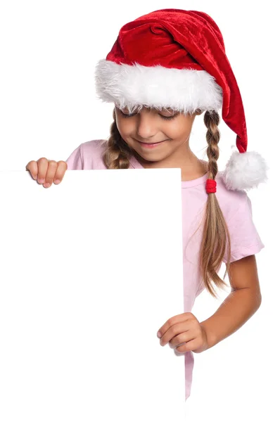 Petite fille en chapeau de Père Noël — Photo