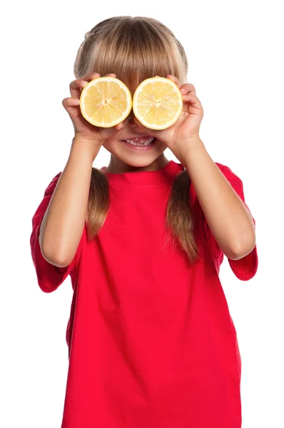 Bambina con limone — Foto Stock