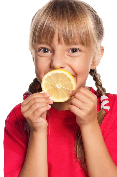 Bambina con limone — Foto Stock