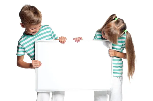 Children with white blank — Stock Photo, Image