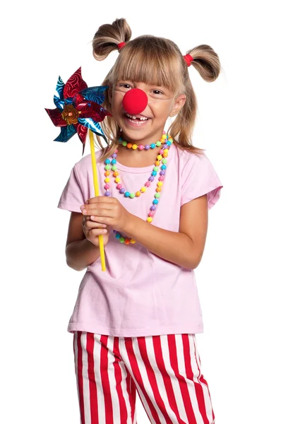 Niña con nariz de payaso — Stockfoto