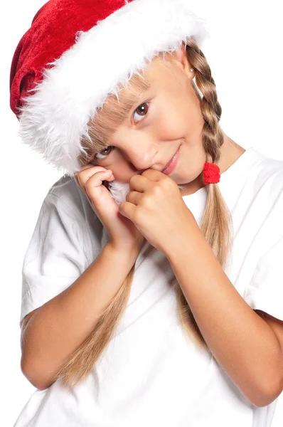 Petite fille en chapeau de Père Noël — Photo