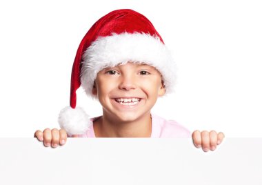 Noel Baba şapkalı çocuk