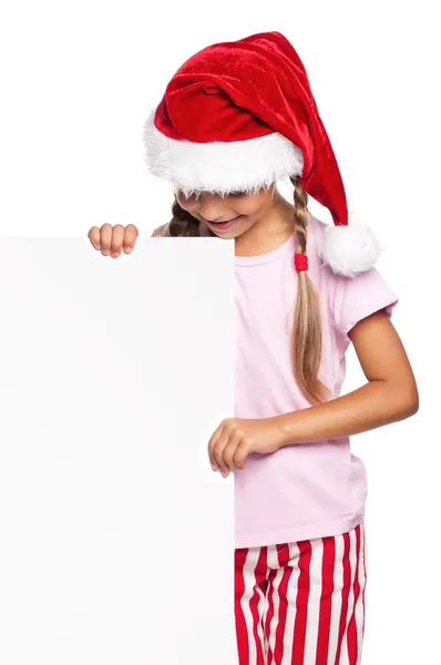 Petite fille en chapeau de Père Noël — Photo