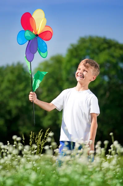 Boy with weathercock — Stock Photo, Image